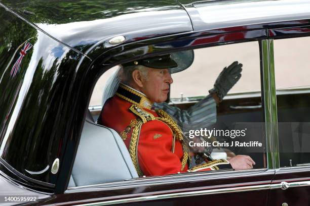 Prince Charles, Prince of Wales rides in a car during the Trooping the Colour parade on June 02, 2022 in London, England. The Platinum Jubilee of...