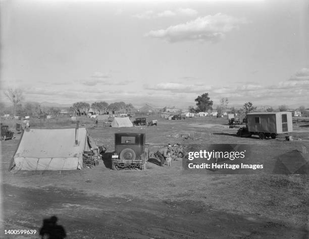 Hooverville of Bakersfield, California. A rapidly growing community of people living rent-free on the edge of the town dump in whatever kind of...