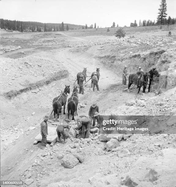 Widtsoe land use adjustment project. Garfield County, Utah. Excavating new spillway of Tropic Dam. Artist Dorothea Lange.