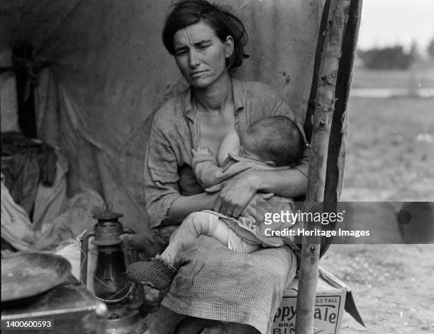 Migrant agricultural worker's family. Seven hungry children. Mother aged thirty-two. Father is native Californian. Nipomo, California. Artist...