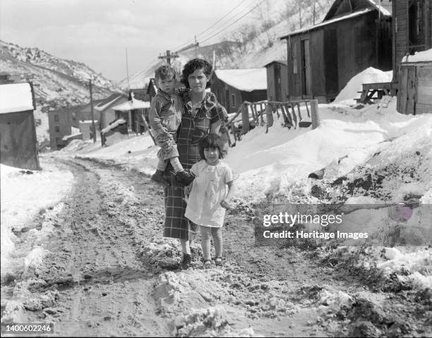 Main street, Utah coal town. Consumers, near Price, Utah. Artist Dorothea Lange.