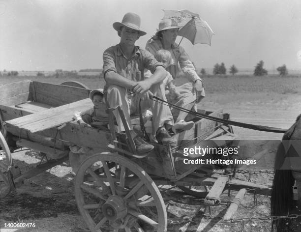 Drought-stricken farmer and family near Muskogee, Oklahoma. Agricultural day laborer. Muskogee County. Artist Dorothea Lange.