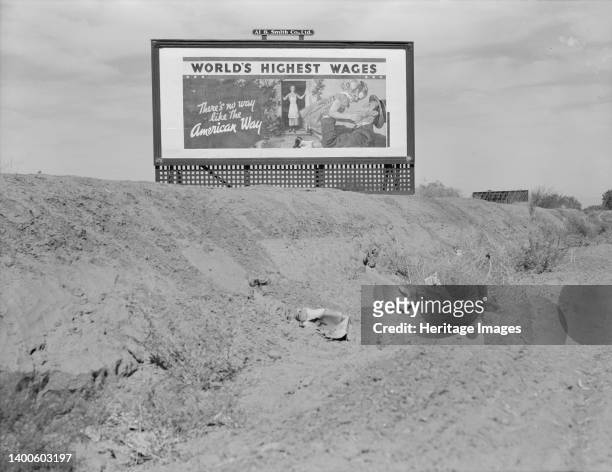 Billboard on U.S. Highway 99 in California. National advertising campaign sponsored by the National Association of Manufacturers. [White family -...