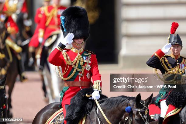 Prince William, Duke of Cambridge and Princess Anne, Princess Royal salute during the Trooping the Colour parade at Buckingham Palace on June 02,...