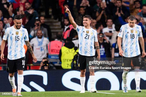 Paulo Dybala of Argentina celebrates his goal with his teammates during the Finalissima Final match between Italy and Argentina at Wembley Stadium on...