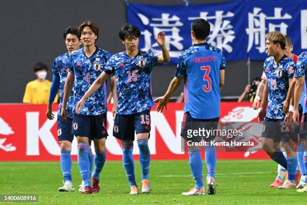 Kaoru Mitoma of Japan celebrates scoring his side's third goal with his teammates during the international friendly match between Japan and Paraguay...