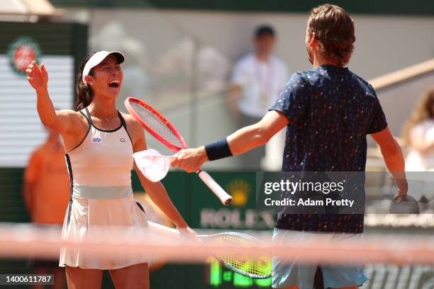 Ena Shibahara of Japan and Wesley Koolhof of France celebrate match point following victory against Joran Vliegen of Belgium and Ulrikke Eikeri of...