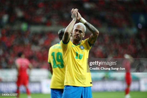 Neymar Jr. Of Brazil applauds fans after scoring his side's second goal during the international friendly match between South Korea and Brazil at...