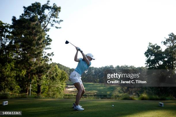 Louise Duncan of Scotland player her tee shot on the tenth hole during the first round of the 77th US Women's Open Championship at Pine Needles Lodge...