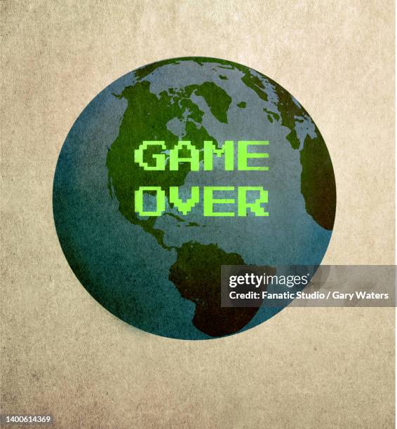 concept image of the earth overlaid with game over text depicting the potential end of the planet - game over short phrase stock illustrations