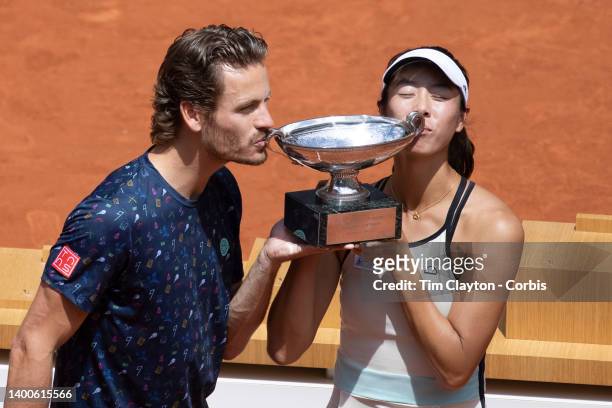 Ena Shibahara of Japan and Wesley Koolhof of The Netherlands with the trophy after winning the Mixed Doubles Final on Court Philippe Chatrier during...