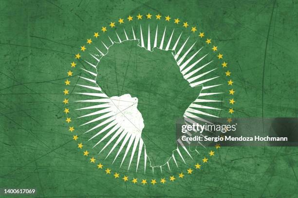 flag of the african union with a grunge texture - african union stock pictures, royalty-free photos & images