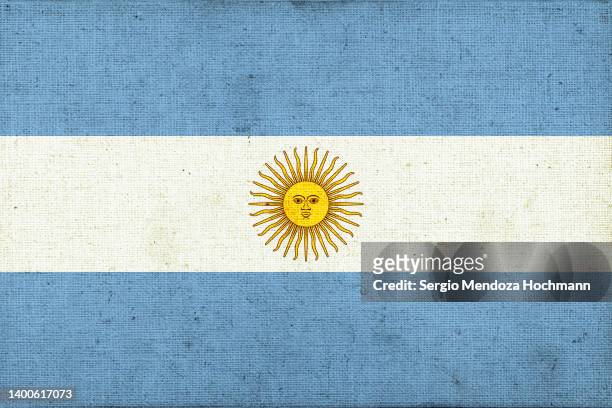 flag of argentina with a grunge texture - argentinische flagge stock-fotos und bilder