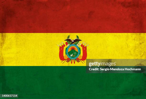 flag of the plurinational state of bolivia with a grunge texture - one of the two official flags of bolivia - bolivian flag stock pictures, royalty-free photos & images