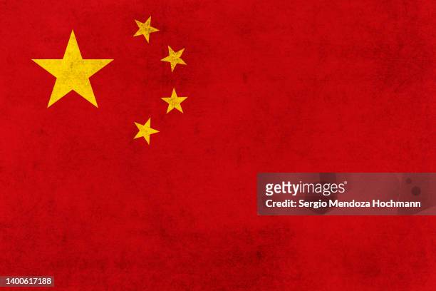 flag of china with a grunge texture - chinese national flag stock pictures, royalty-free photos & images