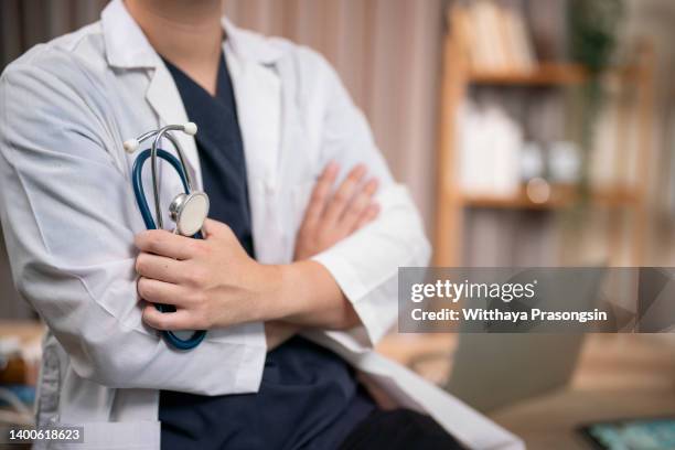 doctor in hospital background with copy space - gen i stock pictures, royalty-free photos & images