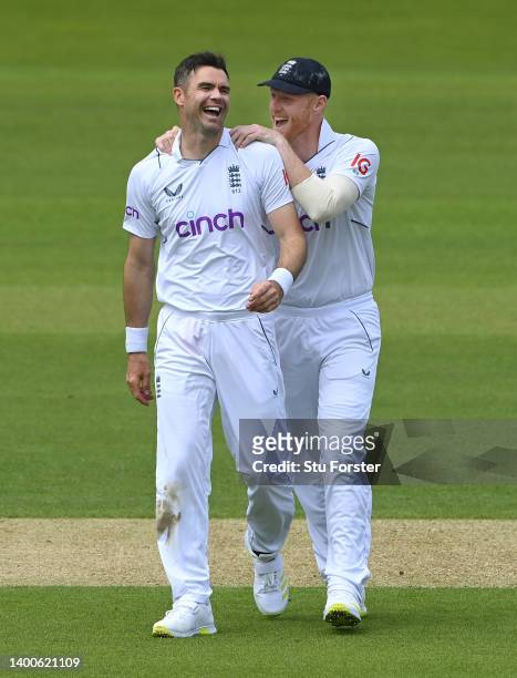 England captain Ben Stokes congratulates bowler James Anderson after he had dismissed New Zealand batsman Kyle Jamieson during day one of the First...