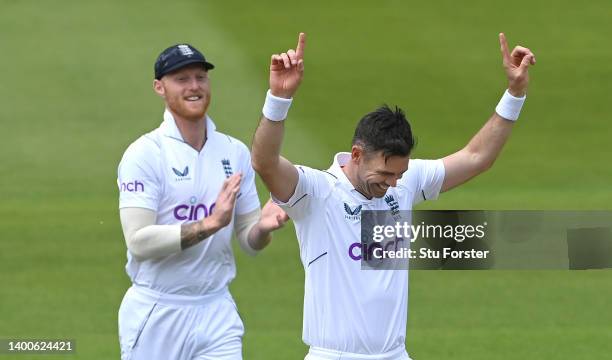 England captain Ben Stokes congratulates bowler James Anderson after he had dismissed New Zealand batsman Kyle Jamieson during day one of the First...