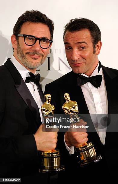 Winner for Best Director for 'The Artist' Michel Hazanavicius and Actor Jean Dujardin, winner of the Best Actor Award for 'The Artist,'arrive at The...