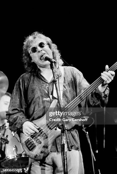 Scottish Rock, Jazz, and Blues musician Jack Bruce plays bass as he performs, with his band, at Greenwich Village's Bottom Line, New York, New York,...