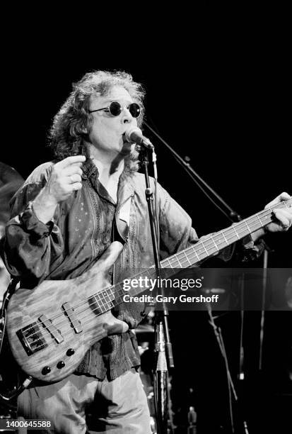 Scottish Rock, Jazz, and Blues musician Jack Bruce plays bass as he performs, with his band, at Greenwich Village's Bottom Line, New York, New York,...