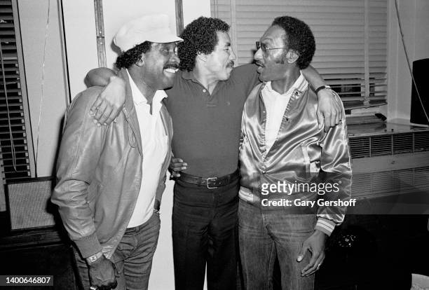 American R&B & Pop singer Smokey Robinson poses with fellow singers Levi Stubbs and Abdul 'Duke' Fakir, the latter two from the group the Four Tops,...