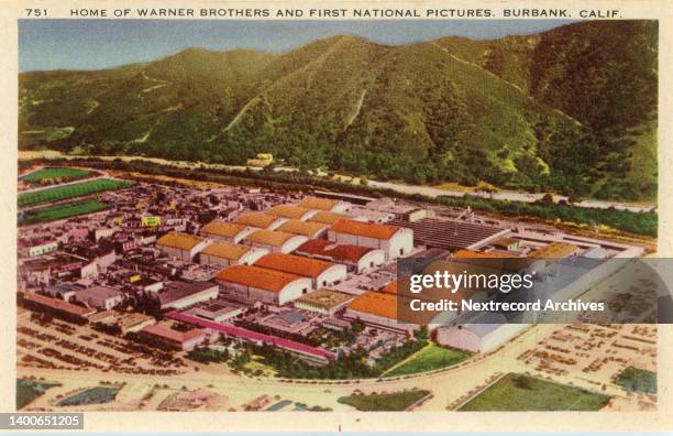 Vintage souvenir postcard published ca 1943 from series depicting Hollywood landmarks, here an aerial view of Warner Brothers Studios and First...