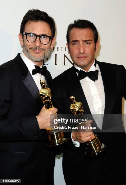 Winner for Best Director for 'The Artist' Michel Hazanavicius and Actor Jean Dujardin, winner of the Best Actor Award for 'The Artist,'arrive at The...