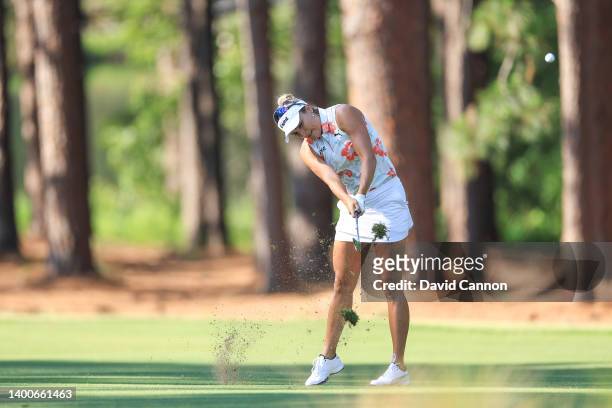 Lexi Thompson of The United States plays her third shot on the 10th hole during the first round of the 2022 U.S.Women's Open at Pine Needles Lodge...