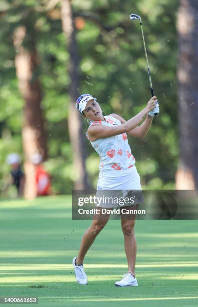 Lexi Thompson of The United States plays her second shot on the 10th hole during the first round of the 2022 U.S.Women's Open at Pine Needles Lodge...