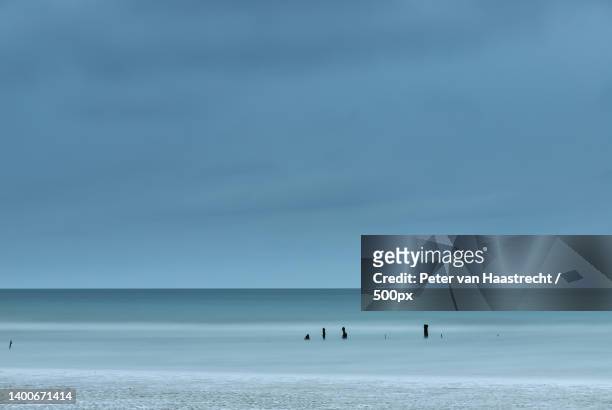 objects in the sea long exposure at the beach,utah beach,france - 第二次世界大戦 ストックフォトと画像