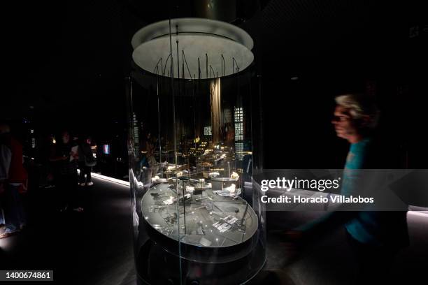 Visitor walks by the showcase housing gold nuggets at the Royal Treasure Museum in Ajuda National Palace on June 02, 2022 in Lisbon, Portugal. The...