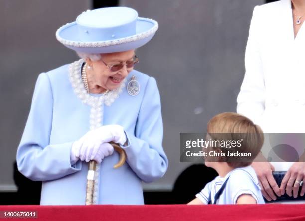 Queen Elizabeth II and Prince Louis of Cambridge on the balcony of Buckingham Palace during Trooping The Colour on June 02, 2022 in London, England....