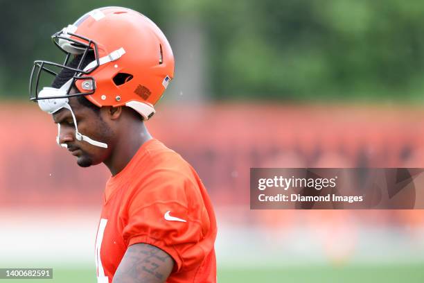 Deshaun Watson of the Cleveland Browns walks off the field after the Cleveland Browns offseason workout at CrossCountry Mortgage Campus on June 1,...