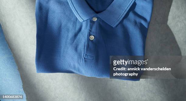blue polo shirt - polo shirt stock pictures, royalty-free photos & images