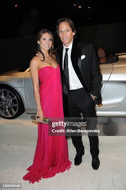 Actress Christina Hale and a guest arrive at Audi Arrivals at 20th annual Elton John AIDS Foundation Academy Awards viewing party on February 26,...