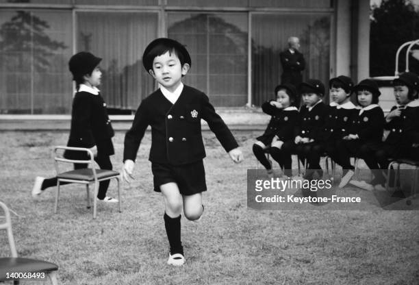 Prince Naruhito and classmates during a picnic held at Imperial Palace of Togu in the sixties in Tokyo, Japan.