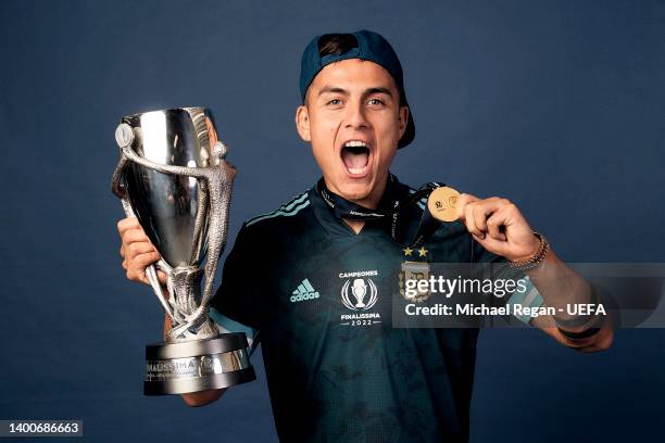 Paulo Dybala poses with the trophy after the Finalissima match between Italy and Argentina at Wembley Stadium on June 01, 2022 in London, England.