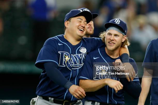 Ji-Man Choi of the Tampa Bay Rays and Taylor Walls celebrate after the game against the Texas Rangers at Globe Life Field on June 02, 2022 in...