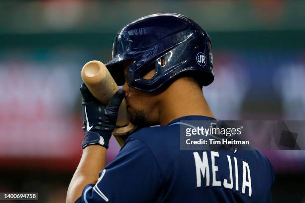Francisco Mejia of the Tampa Bay Rays smells his bat during the game against the Texas Rangers at Globe Life Field on June 02, 2022 in Arlington,...