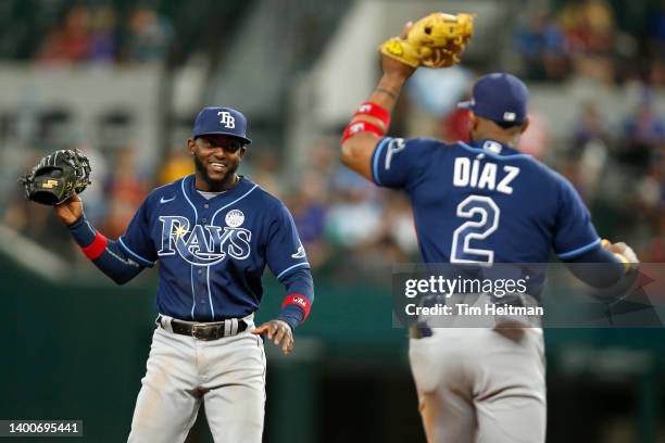 Isaac Paredes of the Tampa Bay Rays celebrates with Yandy Diaz after the game against the Texas Rangers at Globe Life Field on June 02, 2022 in...