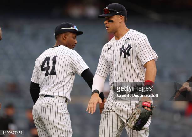 Aaron Judge and Miguel Andujar of the New York Yankees after defeating the Los Angeles Angels in game one of a doubleheader at Yankee Stadium on June...