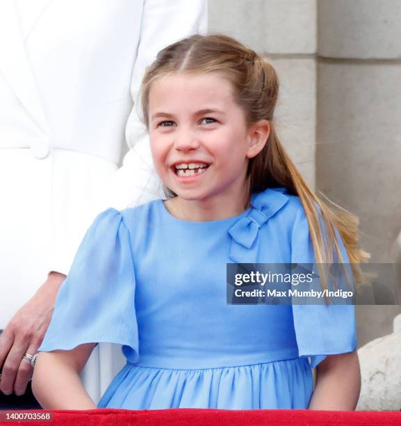 Princess Charlotte of Cambridge watches a flypast from the balcony of Buckingham Palace during Trooping the Colour on June 2, 2022 in London,...