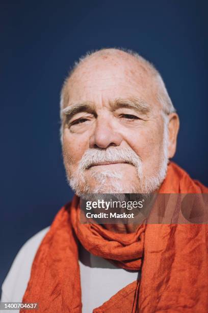 Old Man Orange Background Photos and Premium High Res Pictures - Getty ...