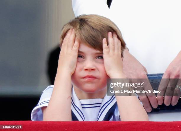 Prince Louis of Cambridge watches a flypast from the balcony of Buckingham Palace during Trooping the Colour on June 2, 2022 in London, England....