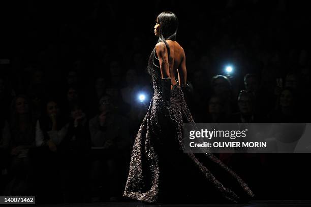 Model Naomi Campbell displays a creation as part of Roberto Cavalli Fall-winter 2012-2013 show on February 27, 2012 during the Women's fashion week...