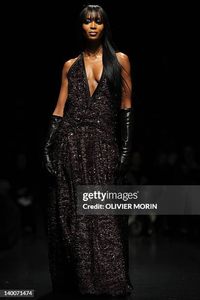 Model Naomi Campbell displays a creation as part of Roberto Cavalli Fall-winter 2012-2013 show on February 27, 2012 during the Women's fashion week...