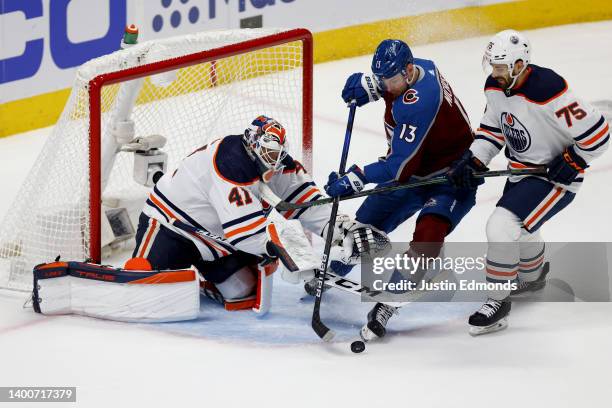 Mike Smith of the Edmonton Oilers makes a save against Valeri Nichushkin of the Colorado Avalanche during the first period in Game Two of the Western...