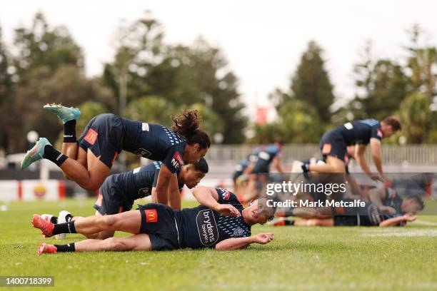 Jarome Luai of the Blues jumps over Jack Wighton of the Blues in a training drill during a New South Wales Blues State of Origin squad training...