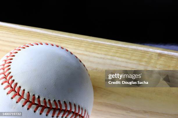 baseball game ball and bat - baseball bat and ball stock pictures, royalty-free photos & images